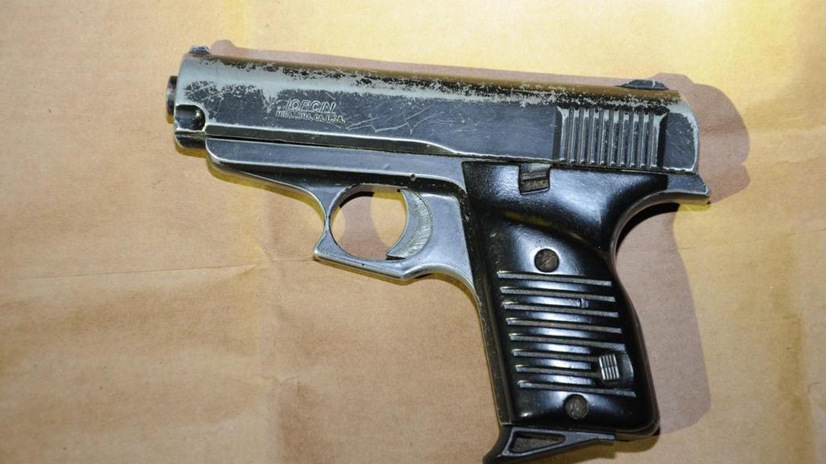 Officers recovered a .380 caliber pistol after neighbors said someone shot at their house.