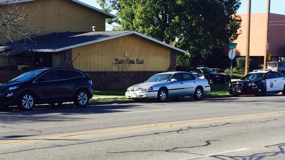 Police arrive at robbery scene on Olive Avenue and Sierra Madre Avenue.