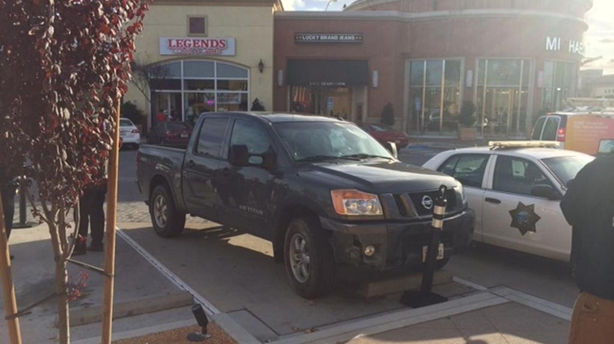 Fashion Fair security guards scanned the license plate of this truck, which turned up a felony warrant.