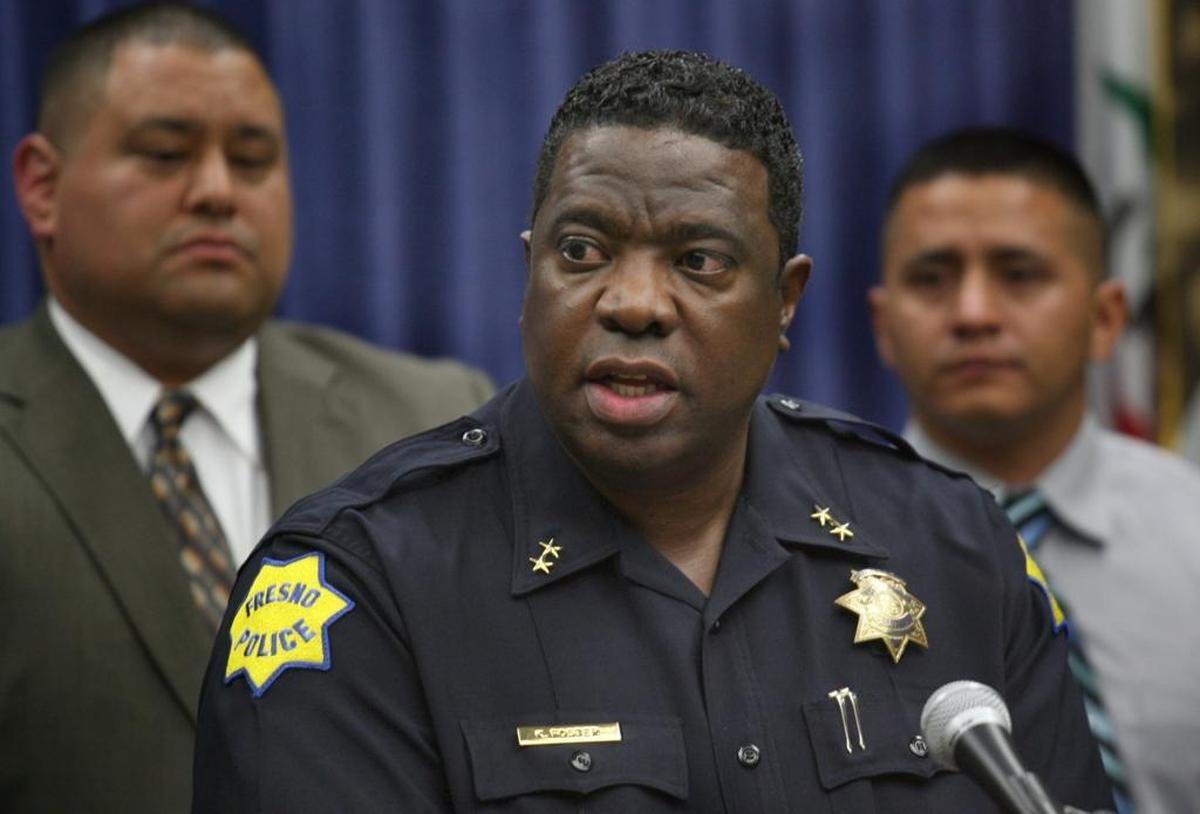 In this 2012 photograph, Deputy Police Chief Keith Foster, center, speaks to the media. Foster, 53, was sentenced in November to four years in prison for conspiring to peddle heroin and marijuana. He is to report to prison on Jan. 13, 2018.