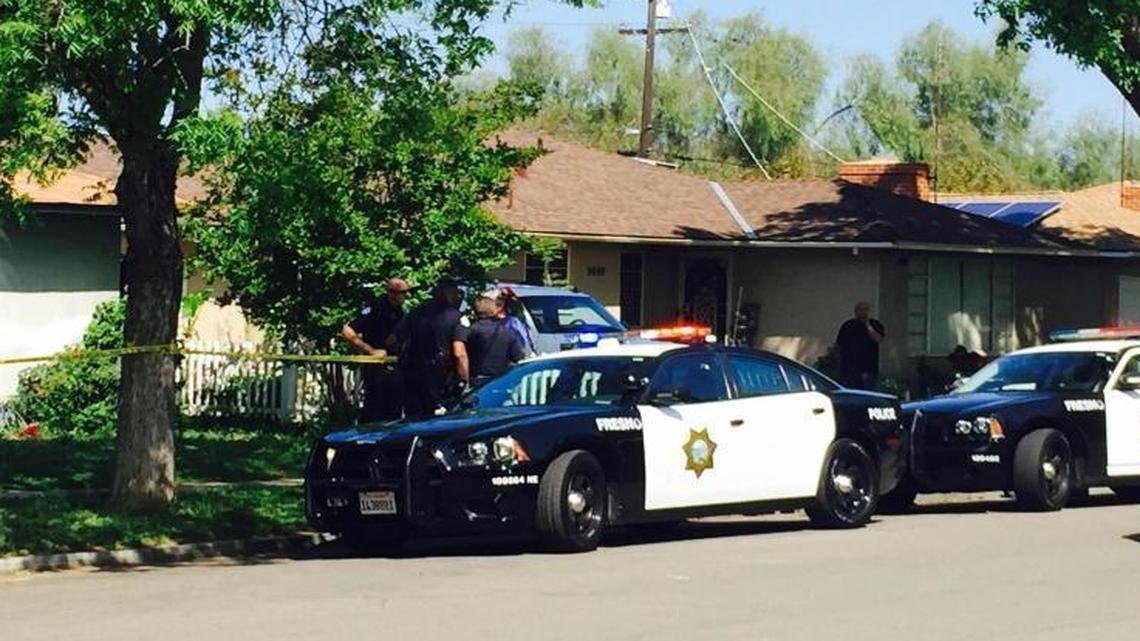Police on the scene of shooting in the 3600 block of North Thesta Avenue in Fresno on Wednesday, April 13, 2016.