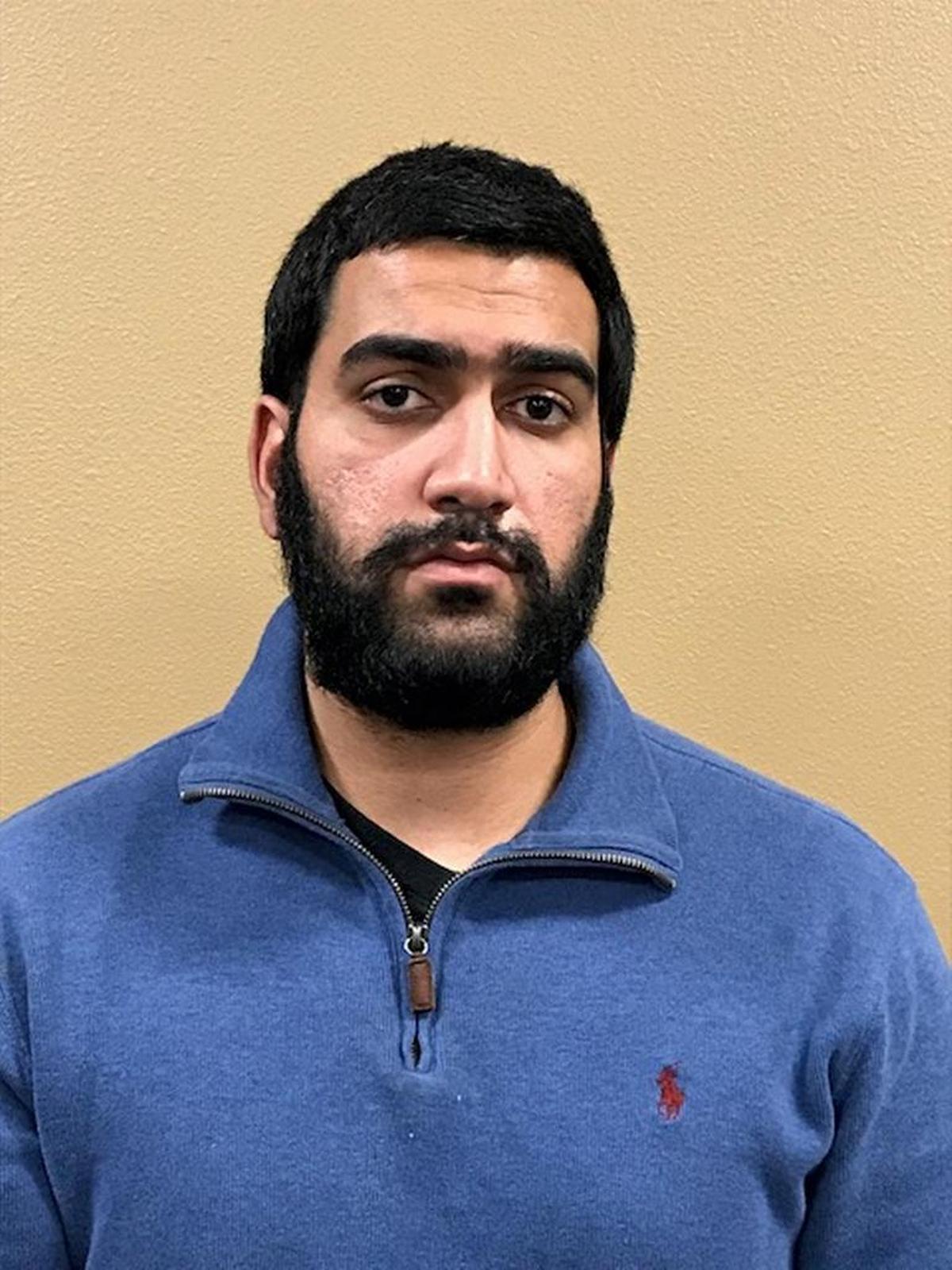 Savirant Singh Athwal, 24, is in jail as a suspect in the Nov. 13 murder of a Madera County store clerk.