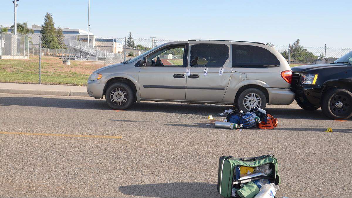 A photo that's part of the Tulare County Superior Court exhibit in the criminal case against Adonis Serna shows the minivan he was driving April 26, 2017, in Woodlake when he was shot by two police officers.