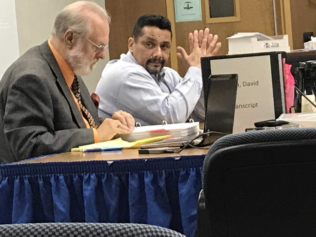 David Pena, right, sits next to defense attorney David Mugridge on Wednesday, Nov. 7, 2018, at the start of trial in Fresno Superior Court, where he is accused of killing his wife, Martha Mendiola, in November 2016. Pena, 51, contends he is not guilty.