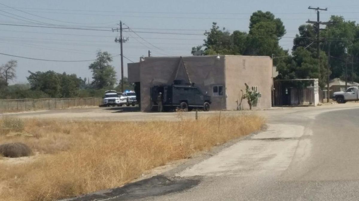Fresno County Sheriff’s deputies and members of its SWAT team have set up a perimeter at Shorty’s Camp in Selma to look for a wanted parolee.