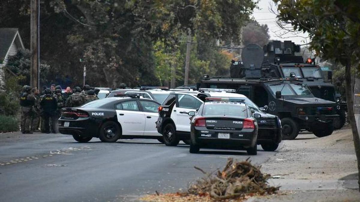 Fresno police, including a SWAT team, along with federal Bureau of Alcohol, Tobacco and Firearms officers, were at multiple locations in west Modesto on Thursday morning. At least four people were detained outside a home or homes on South Martin Luther King Drive.