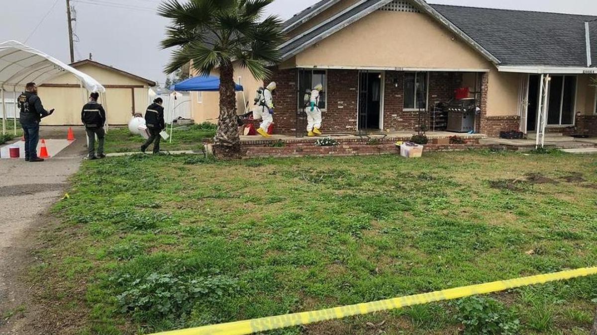 State Department of Justice investigators on Tuesday, Jan. 16 2018 at the scene of an apparent double murder near Chowchilla. A methamphetamine lab was discovered nearby.
