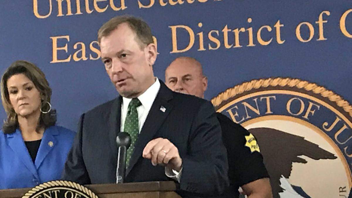 U.S. Attorney McGregor W. Scott held a news conference on Monday, Oct. 1, 2018, in U.S. District Court in Fresno to tout the success of Project Safe Neighborhoods, a nationwide initiative that brings together federal, state and local law enforcement officials to figure how the best way to attack to the most pressing problems in a community. In the backgrounds are Fresno County District Attorney Lisa Smittcamp and Fresno Police Chief Jerry Dyer.
