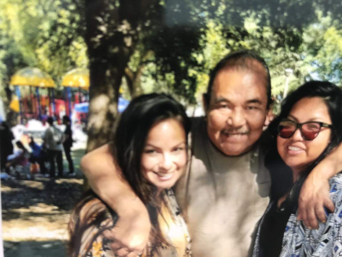 In this undated photograph Lorin Kane Sr. enjoys time with his daughters Elida Gonzales, left, and Lisa Kane, right.