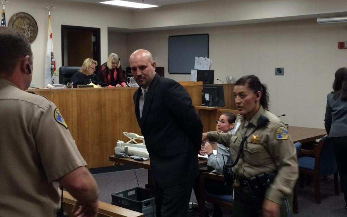 William Nulick is led away in January 2016 after being sentenced to five years in prison.