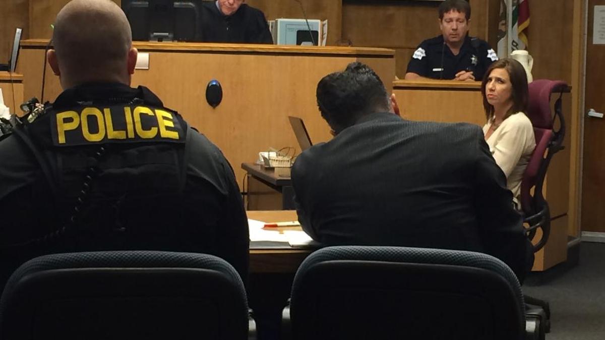 After hearing two days of testimony, Judge W. Kent Hamlin rule Wednesday in Fresno County Superior Court that four Fresno gang members will stand trial in connection with the shooting of Edison High teacher Steven Guerrero, who survived the Dec. 19, 2013, nighttime attack in a classroom. In the photo are Fresno police officer David Ponek, who testified at the hearing, and court reporter Noelle Acosta. Also pictured are Sgt. Justin Hoagland, left, and prosecutor Galen Rutiaga, right.