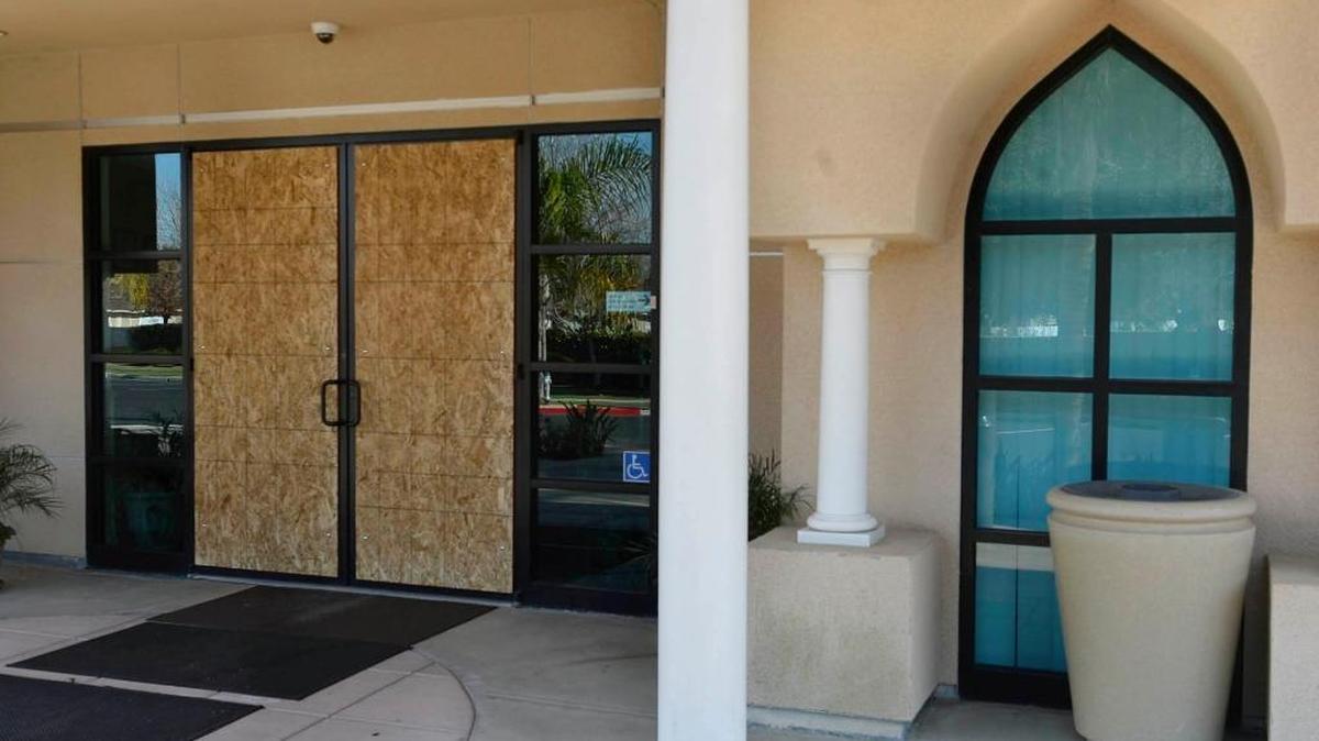 
Doors were boarded up at the Islamic Cultural Center of Fresno at 2111 E. Nees Ave. following vandalism caused by a Clovis man.
