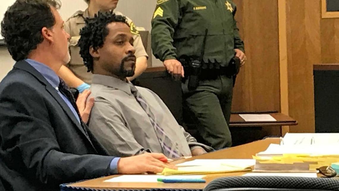 Accused Fresno rampage killer Kori Ali Muhammad, right, quietly sits with his attorney, Richard Beshwate Jr., after Judge Jonathan Conklin on Monday, Jan. 8, 2018, admonished him to not interrupt the proceedings by shouting “black people need reparations.”