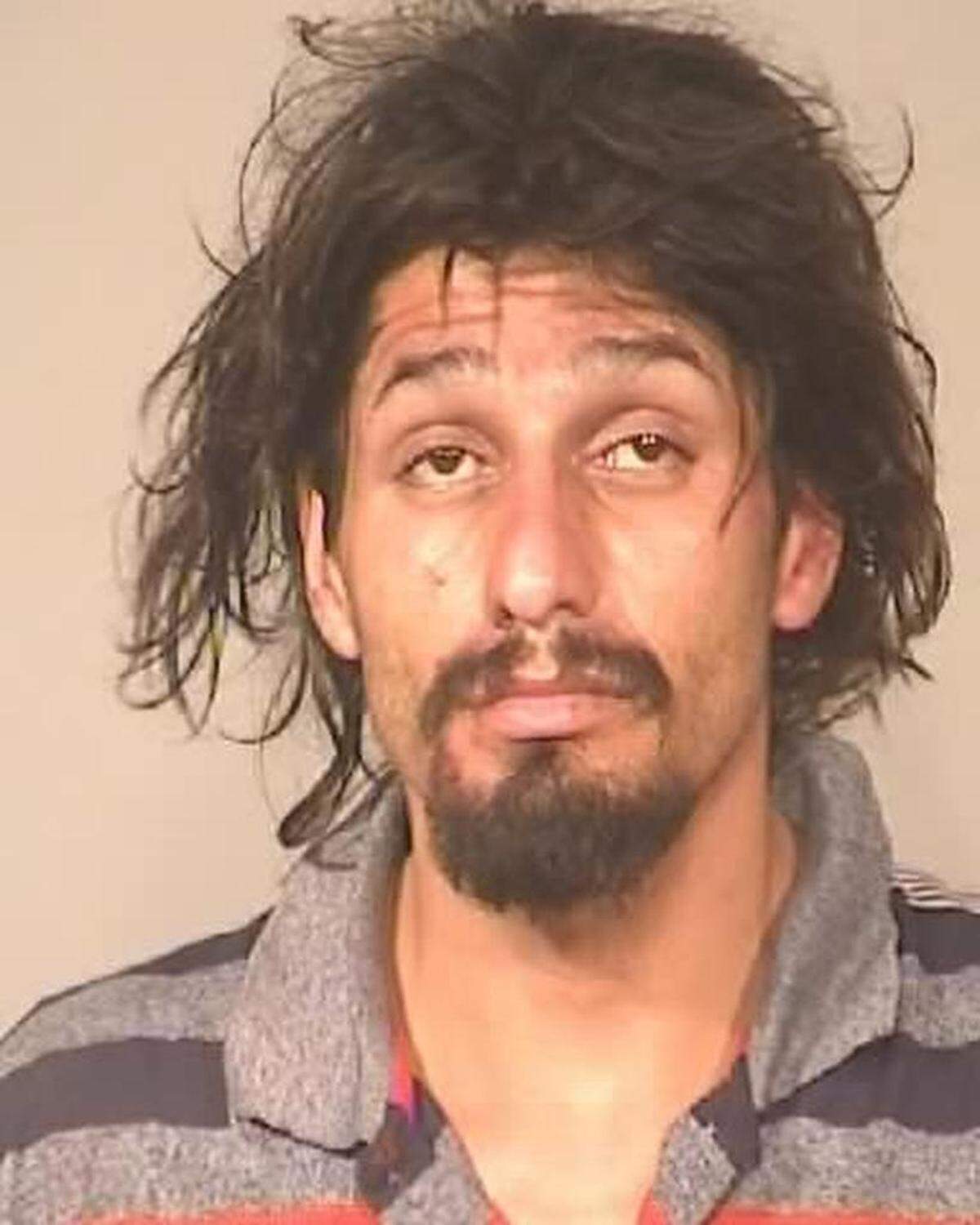 Fresno police officers arrested Alfonso Ramos, 33, on a charge of illegally possessing a loaded firearm during a traffic stop on Sept. 3, 2018.