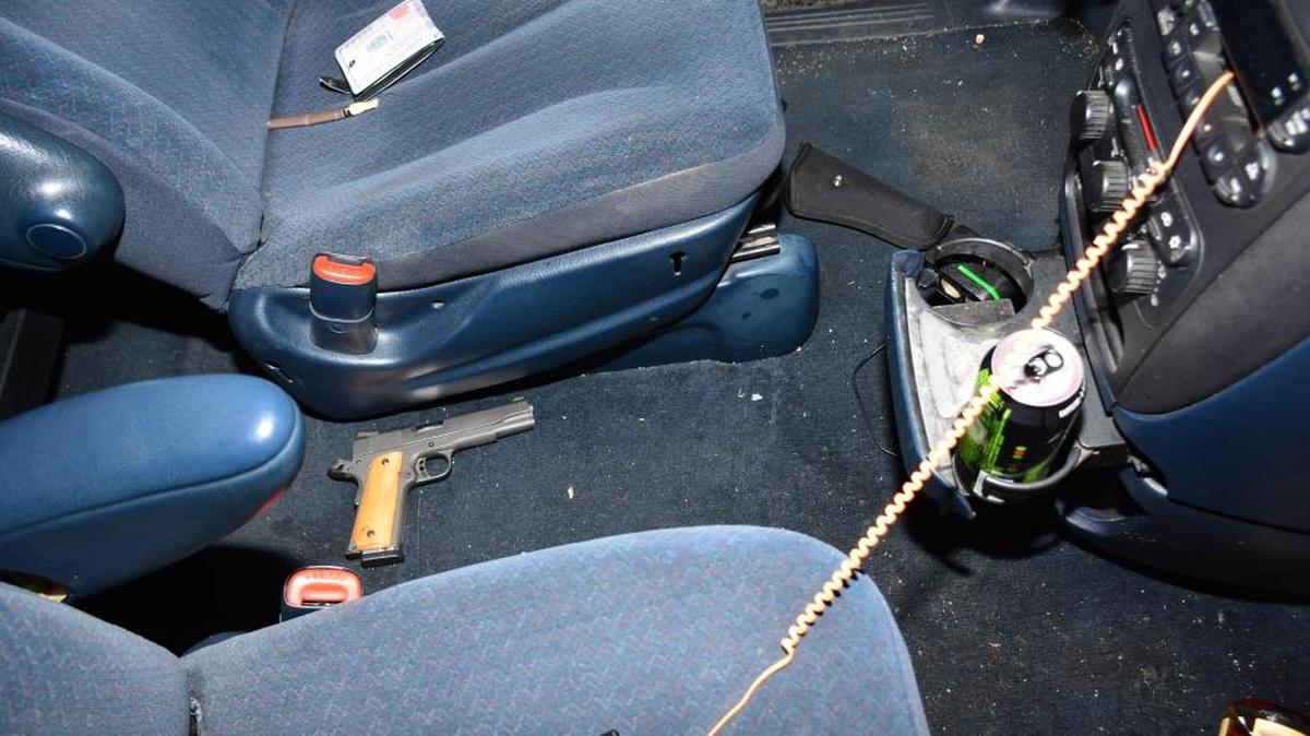 A search of the minivan revealed a loaded 9 mm handgun lying in plain view next to the driver’s seat.