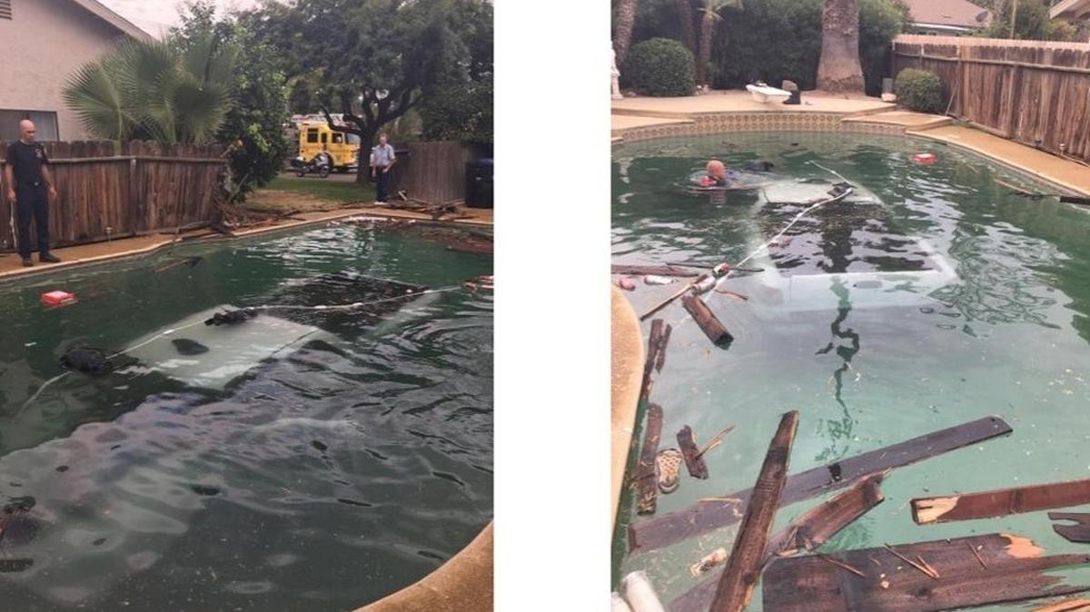 A truck crashed through a fence and into a pool on Aug. 3, 2017 in Visalia. The driver fled after the crash.