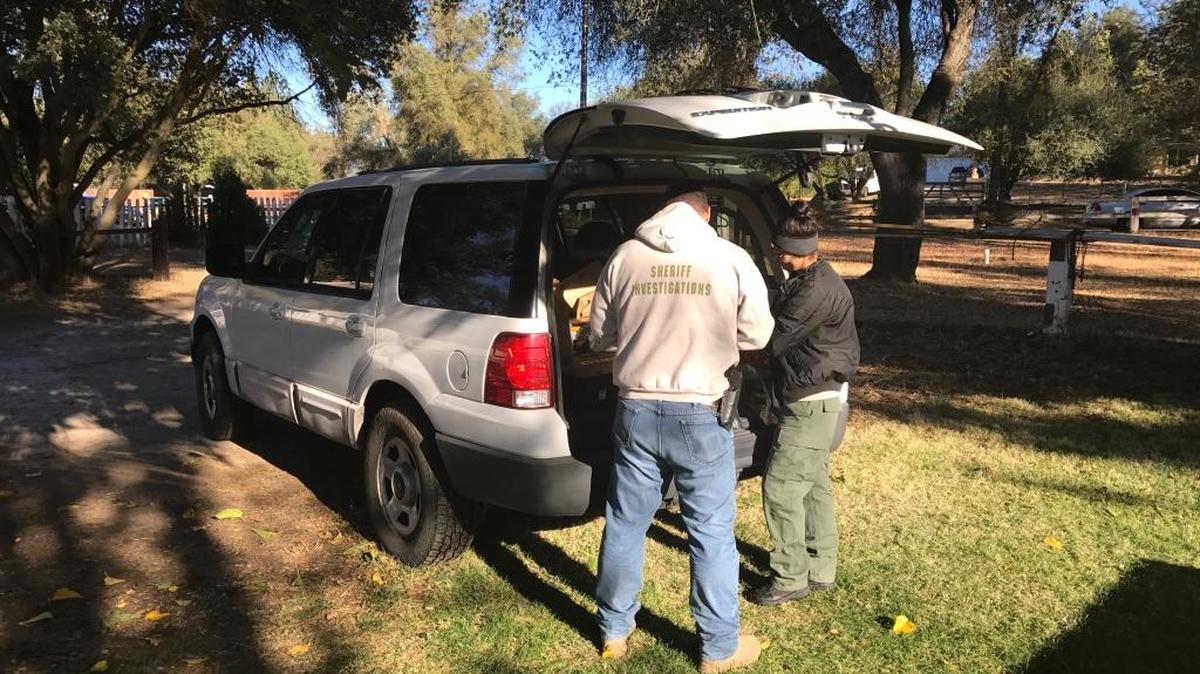 Madera County sheriff’s detective John Grayson and crime-scene investigator Daniella Romero arrive at an Ahwahnee home were a man was killed.