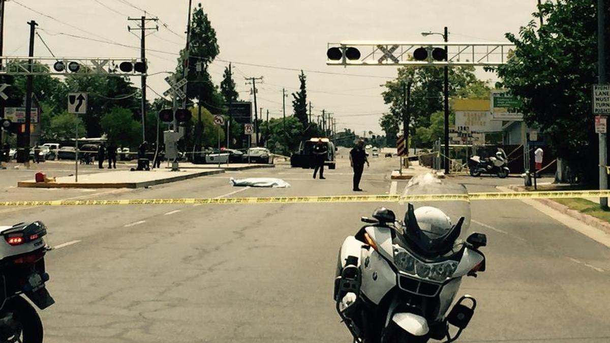
Fresno police investigate the scene of a fatal hit-and-run Monday afternoon, July 20, 2015 on Cedar Avenue near Floradora Avenue.
