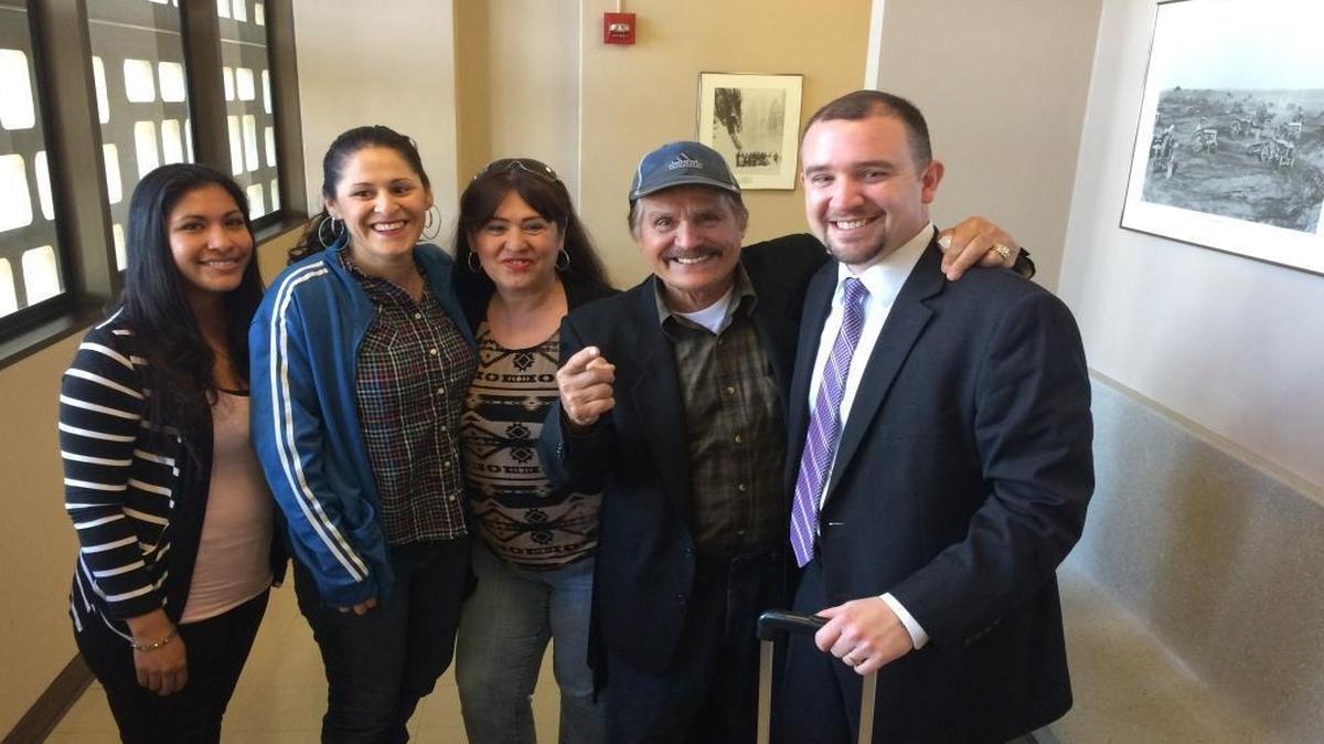 The relatives of David Vera, who was killed in July 2007, stand outside Judge Edward Sarkisian Jr.’s courtroom Monday, to thank prosecutor Brian Hutchins. Victor Estrada, who was convicted of killing Vera, was sentenced to life in prison. From left to right are Vera’s fiance, Aurelia Lopez, his sister, Hortencia Vera, his mother, Maria Montez, his father, Osvaldo Vera, and Hutchins.