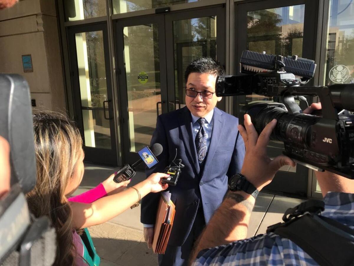 Television reporters surround Fresno attorney Charles Lee of the Federal Defenders office who is defending suspected American terrorist Everitt Aaron Jameson, who was arraigned Friday, Jan. 5, 2018, in U.S. District Court in Fresno on terrorism charges.