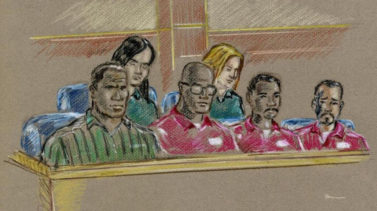 Rafael Guzman Jr., far right in the front row in this sketch from inside Fresno federal court in 2015, is one of seven defendants in a federal drug trafficking case. From their initial court appearance in March 2015: Front row from left, Fresno’s former Deputy Police Chief Keith Foster, Randy Flowers, Dennis Foster and Guzman. Back row from left, Sarah Ybarra and Jennifer Donabedian. A seventh defendant, Ricky Reynolds, did not make an appearance that day.