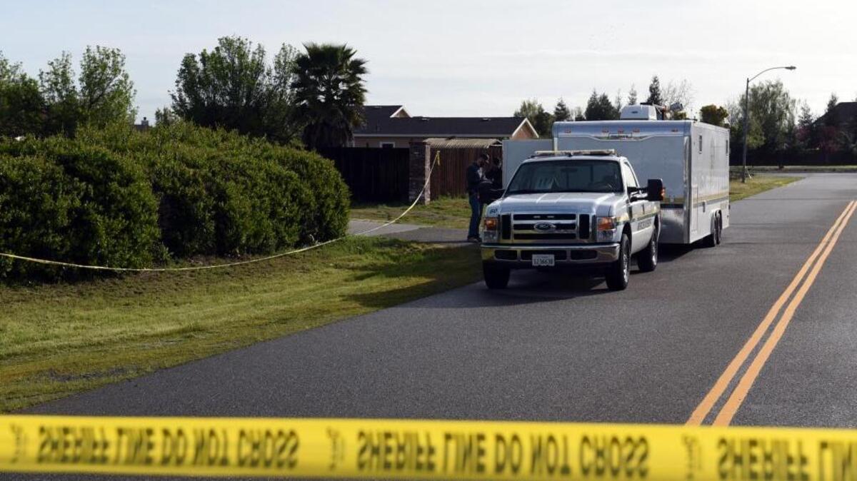 Merced County Sheriff’s detectives investigate a home in the 3100 block of Franklin Avenue on Monday, where a home invasion that turned into a gunfight left to injured and one dead. The home was operating as a marijuana dispensary, deputies said.