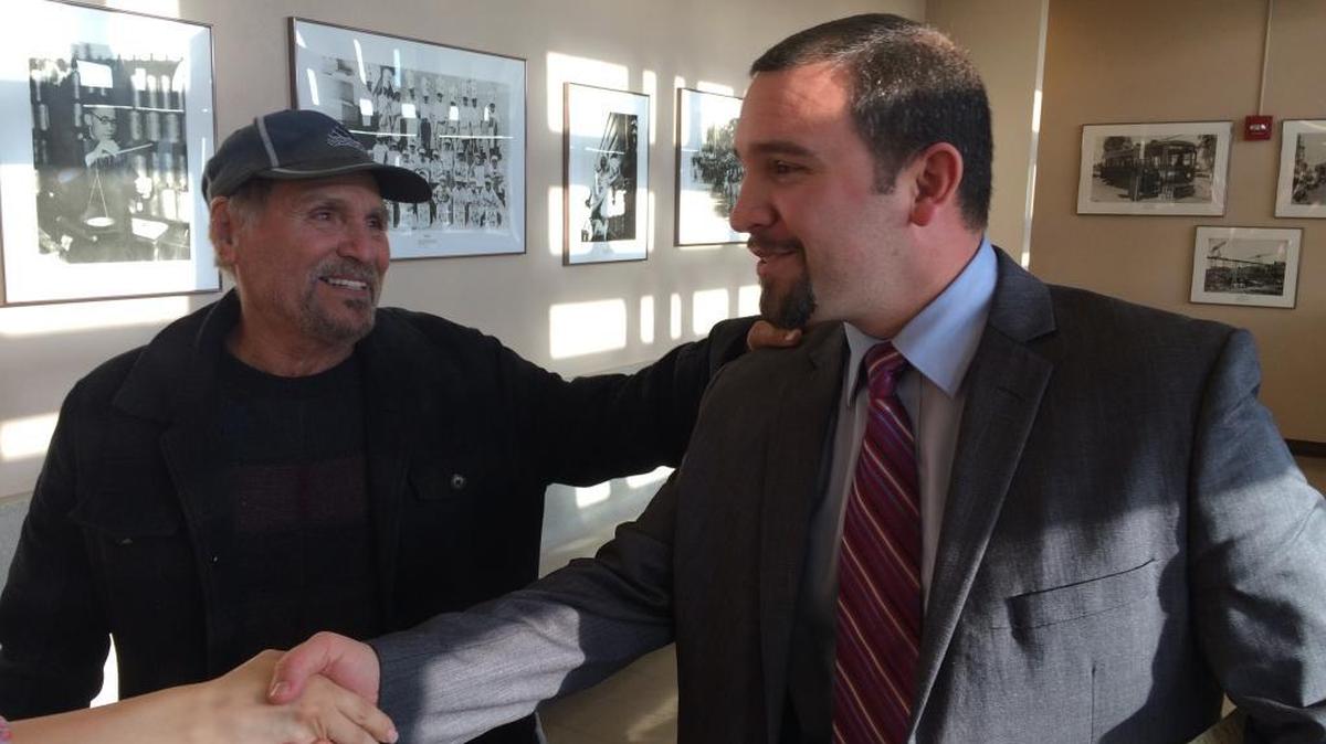 Oswaldo Vera, left, and his family thank Fresno prosecutor Brian Hutchins after a jury on Monday convicted Victor Estrada of first-degree murder in the drive-by killing of Oswaldo’s son, David Vera, in 2007.