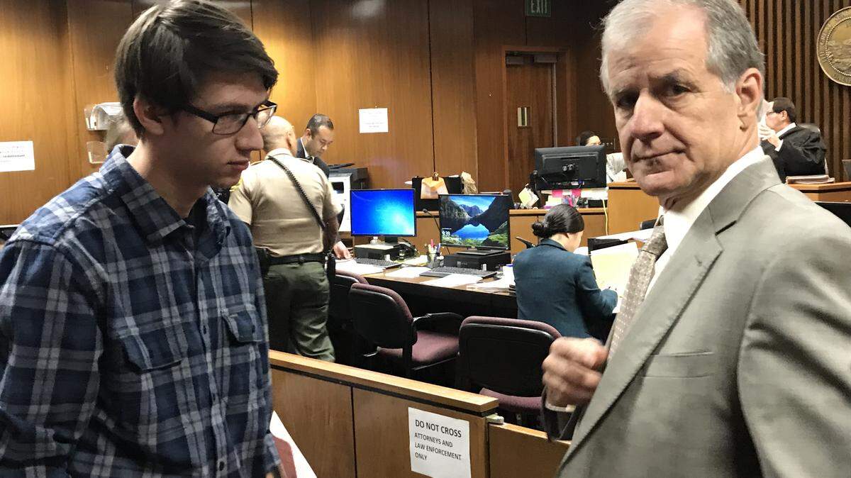 On Thursday, Aug. 13, 2018, Kyle Dwelle, 18, left, attends a Fresno Superior Court hearing with his attorney, Mark Coleman. Dwelle is accused of threatening to do a mass shooting at Buchanan High School in Clovis. He spent 12 week in jail without bail before Judge Michael G. Idiart allowed him to be released in August into a newly-enacted mental health program.