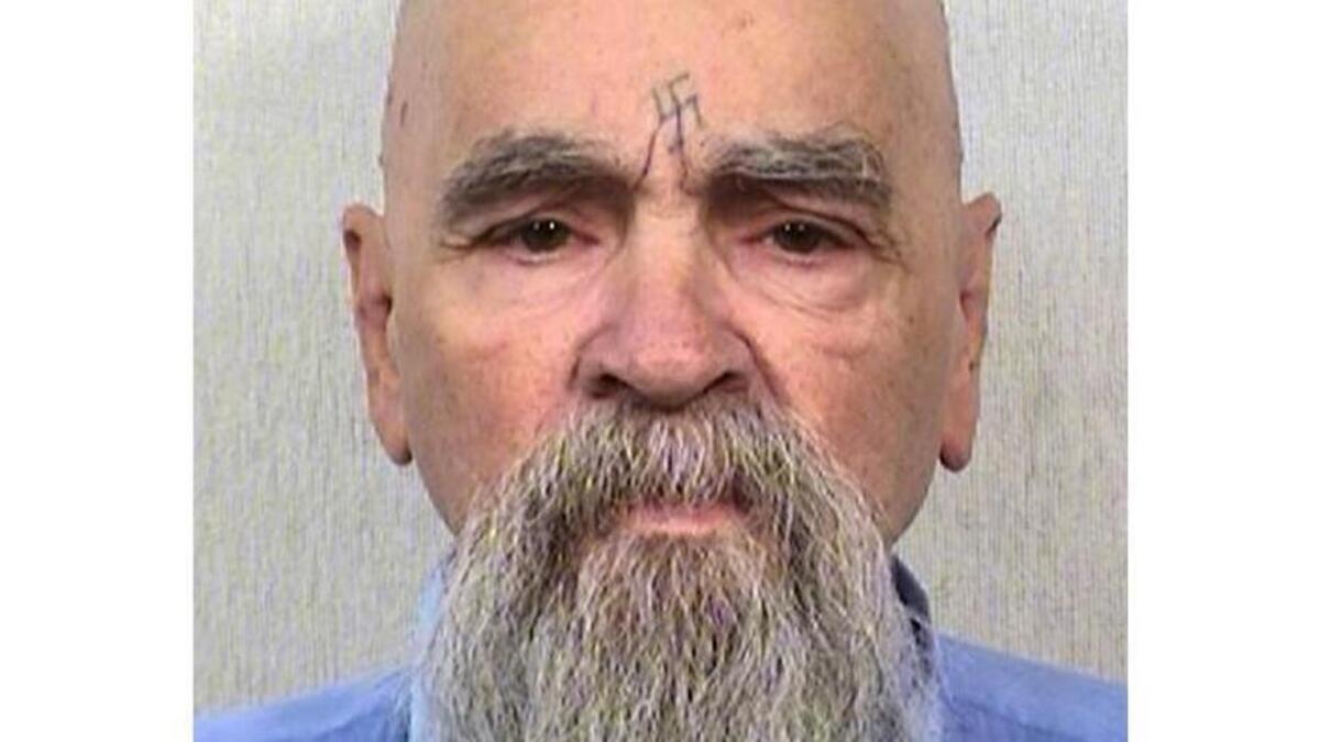 An October 2014 file photo of Charles Manson, provided by California Department of Corrections and Rehabilitation. A prison official said the cult leader and mass murderer is alive after being hospitalized in Bakersfield.