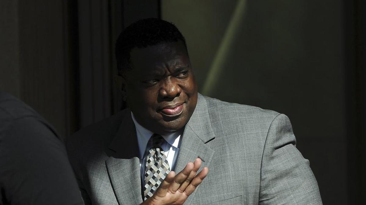 Keith Foster waves as he exits the federal courthouse during his drug trafficking trial in May in Fresno. A federal judge on Monday denied Foster’s request for a new trial. Foster was convicted of conspiring to peddle heroin and marijuana.