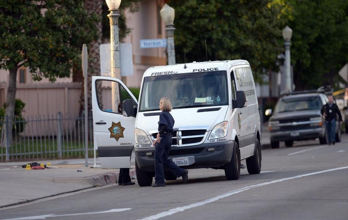 Fresno Police department personnel continue to investigate the scene into the evening near the Catholic Charities’ Fresno Family Resource Center after three men were killed by a gun man on Tuesday morning, April 18, 2017, in Fresno. Two of the victims were shot near the Catholic Charities building by suspect Kori Ali Muhammad.