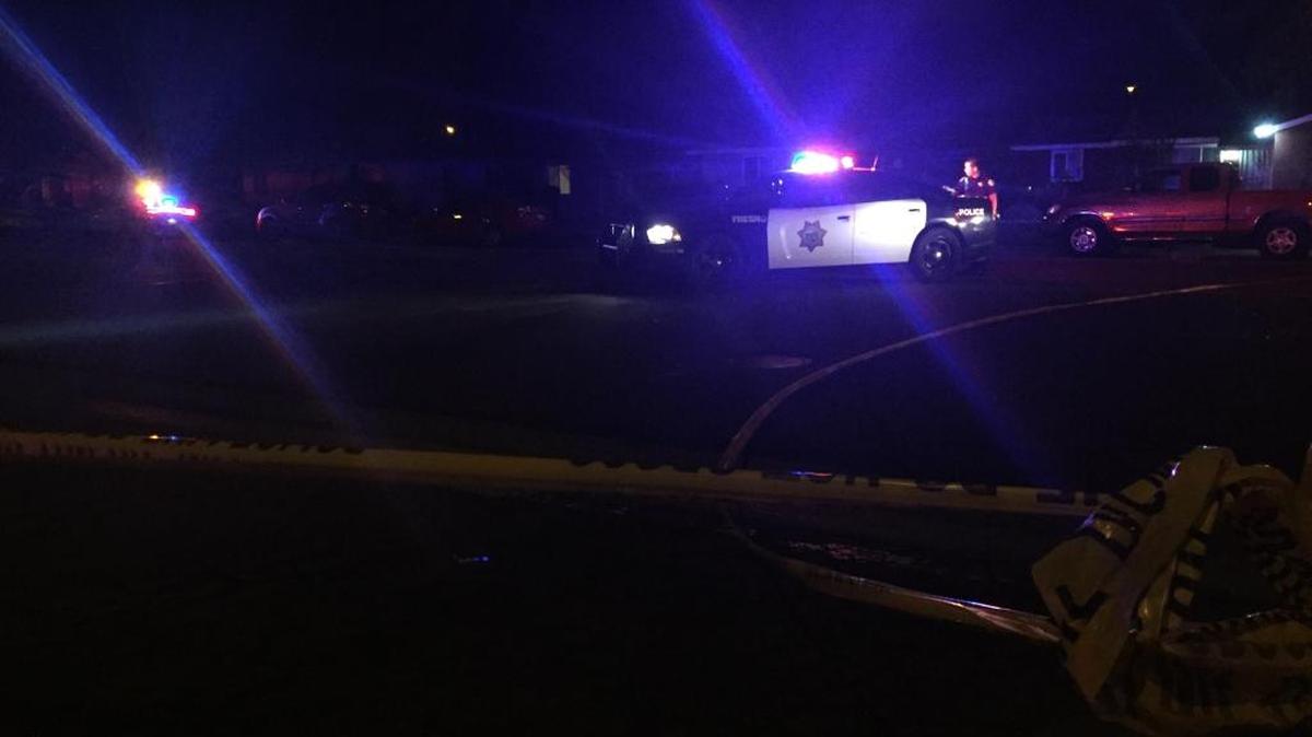 Police investigate a deceased body that was on the ground in central Fresno and possibly involved in a shooting and hit-and-run Tuesday night.