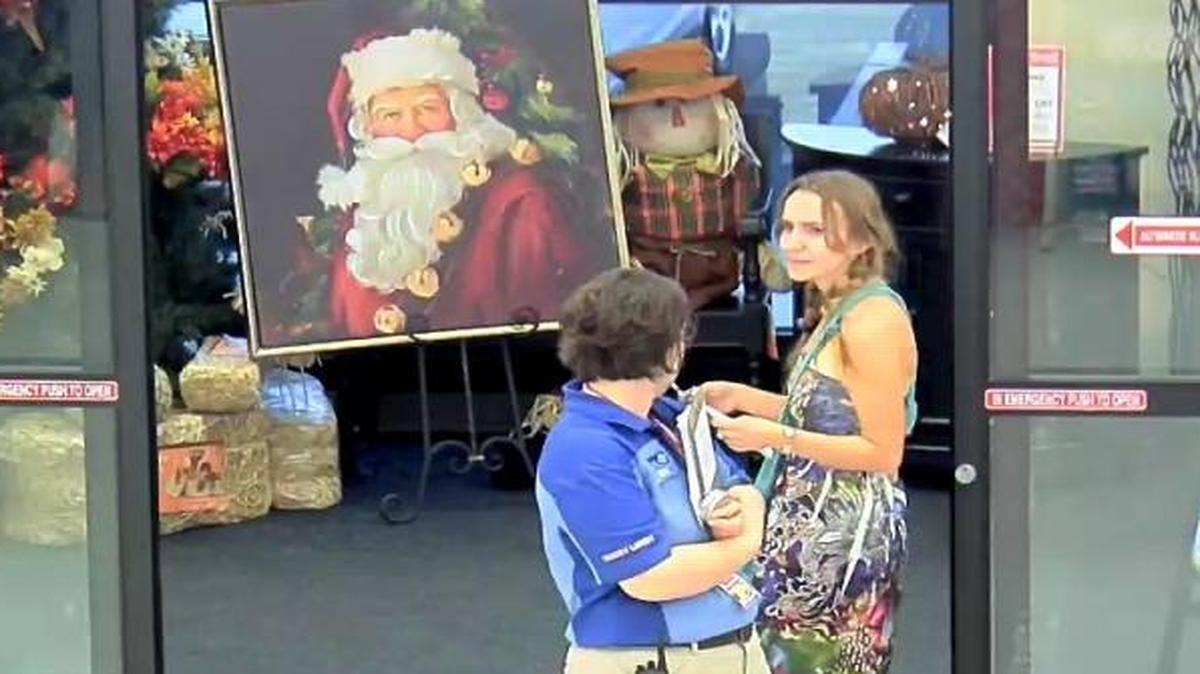 A Hobby Lobby employee confronts an alleged shoplifter on Sept. 27 in this image taken from surveillance video and provided by Fresno police.