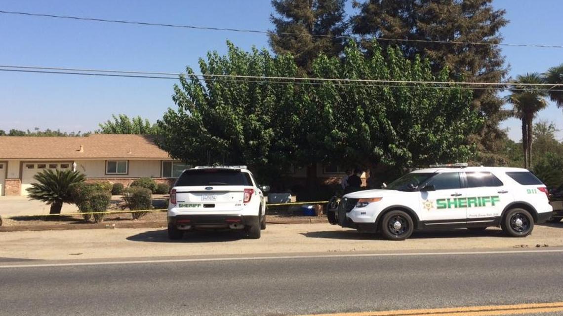 
Tulare County sheriff’s vehicles are parked outside a home where an 82-year-old woman was shot by deputies. Sheriff Mike Boudreaux said the woman brandished a gun at two deputies, who fired their weapons. The woman was struck in the arm and is expected to survive.
