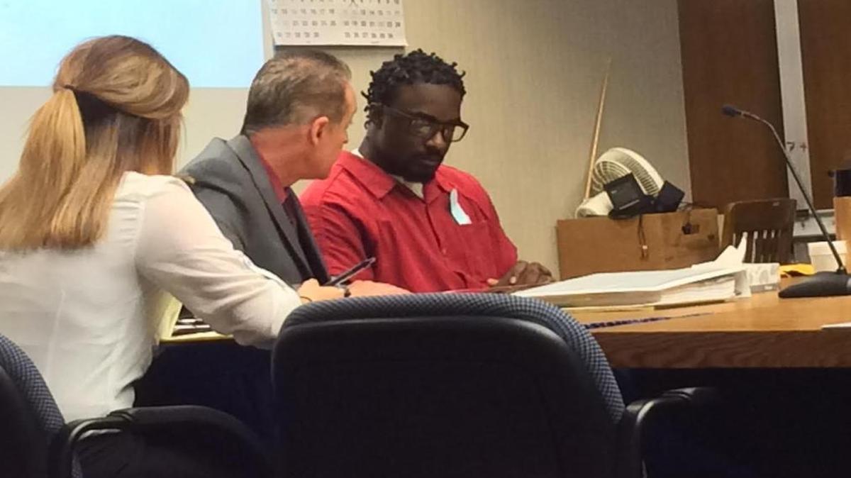 Domenek Greenberry listens to his attorney during a 2016 preliminary hearing in Fresno County Superior Court.