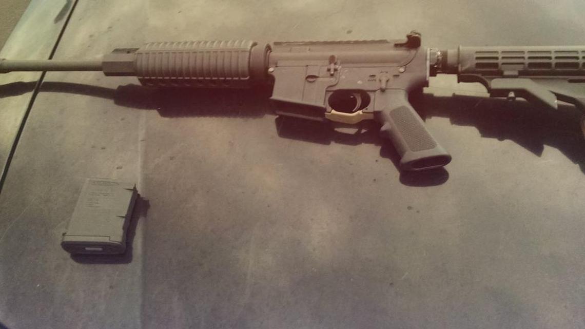 
Police say a driver weaving through traffic near Shaw and Blackstone avenues Thursday night, July 30, 2015 was carrying an AR-15 type rifle.
