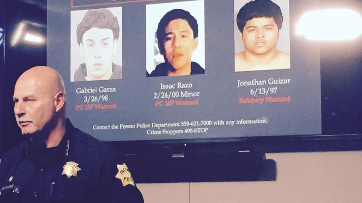 Fresno Police Chief Jerry Dyer discusses the murder case of Amber Baker, who was shot inside her Fresno Apartment. Two men wanted on murder charges and a third man sought in connection with the case are pictured behind him.
