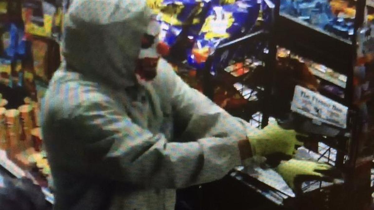 Corcoran police say a man wearing clown mask robbed a store.