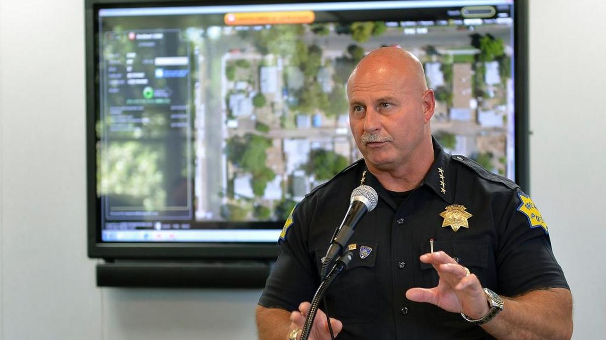 Fresno Police Chief Jerry Dyer speaks during a press conference in this 2015 photo. On Tuesday he announced a plan to join with faith groups to take juveniles off the streets on Friday nights and get them into centers where they can safely hang out.