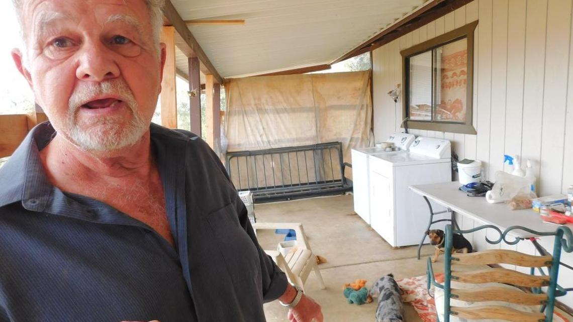 John “Jack” DiLorenzo, 75, lives alone with more than a dozen dogs in a hilltop home at the end of an unmarked road off Butternut Lane in Squaw Valley.