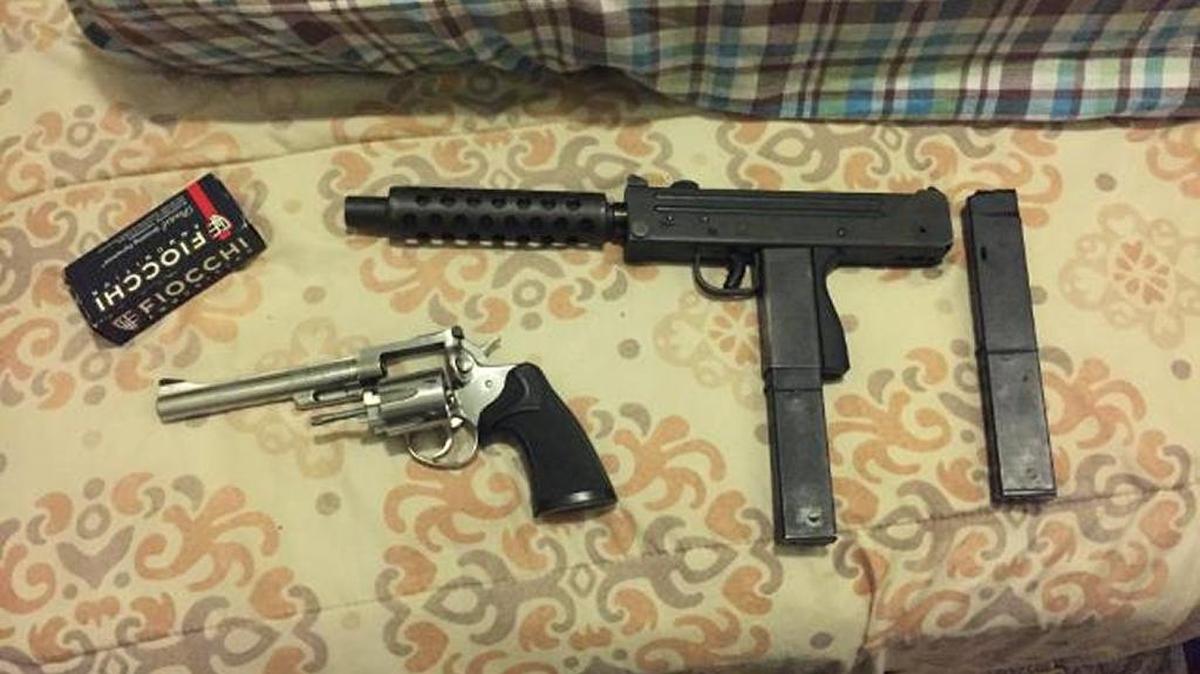 Police seized a revolver and a Mac-11 semi-automatic weapon after a traffic stop