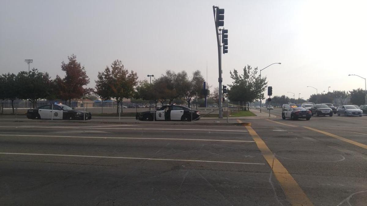 Fresno police investigate a shooting Sunday afternoon at Peach Avenue and Kings Canyon Road, near Sunnyside High School.