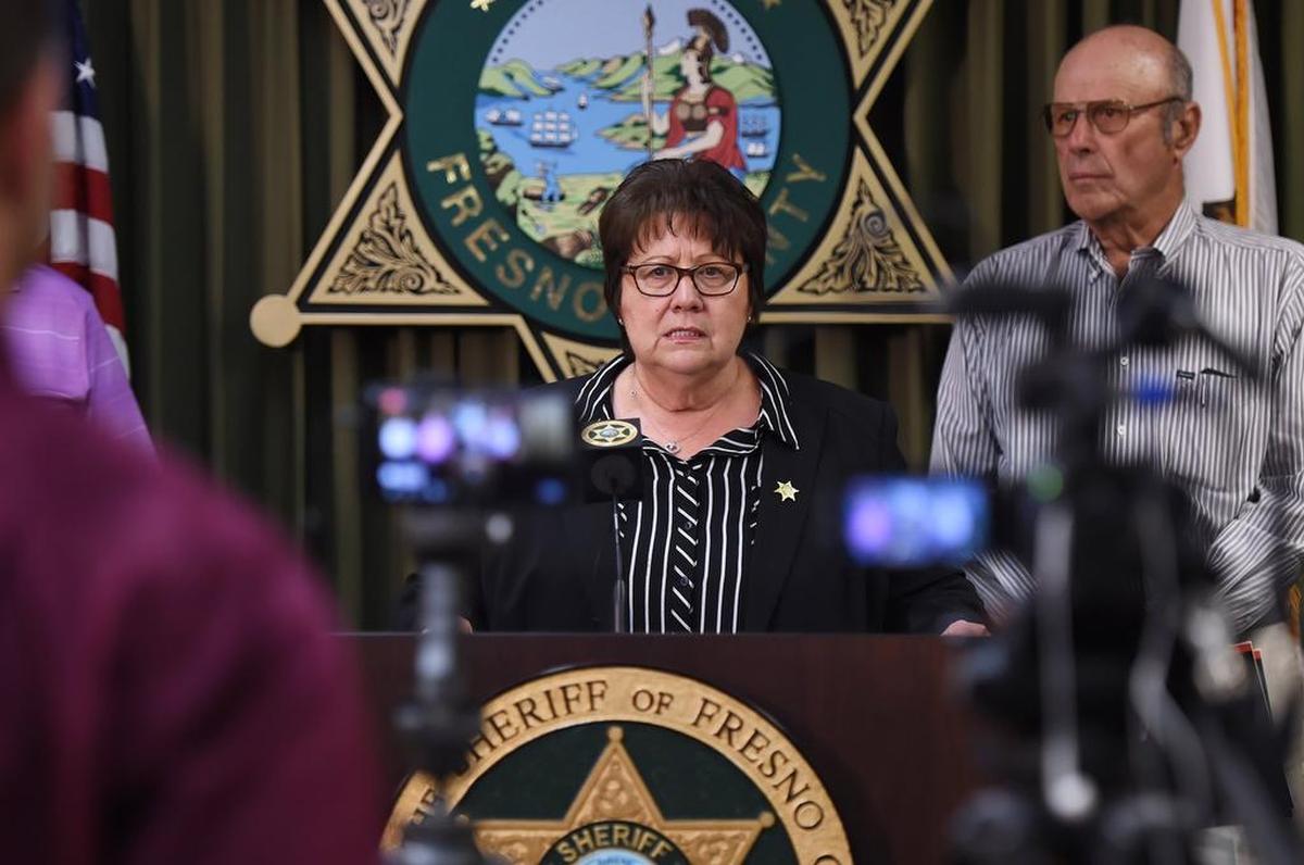 Fresno County Sheriff Margaret Mims, center, announces an increase of a cash reward to $18,000 for information leading to a conviction in the shooting death of 17-year-old San Joaquin Memorial High School student Nick Kauls in Old Fig Garden, during a press conference held Monday, July 2, 2018 in Fresno. Old Fig Garden residents contributed $8,000 to the reward.