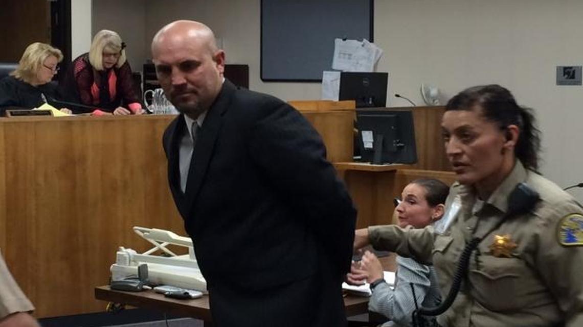 William Nulick, a former Tulare County sheriff’s deputy, is taken away in handcuffs after a judge sentenced him to prison Wednesday, Jan. 13, 2016.