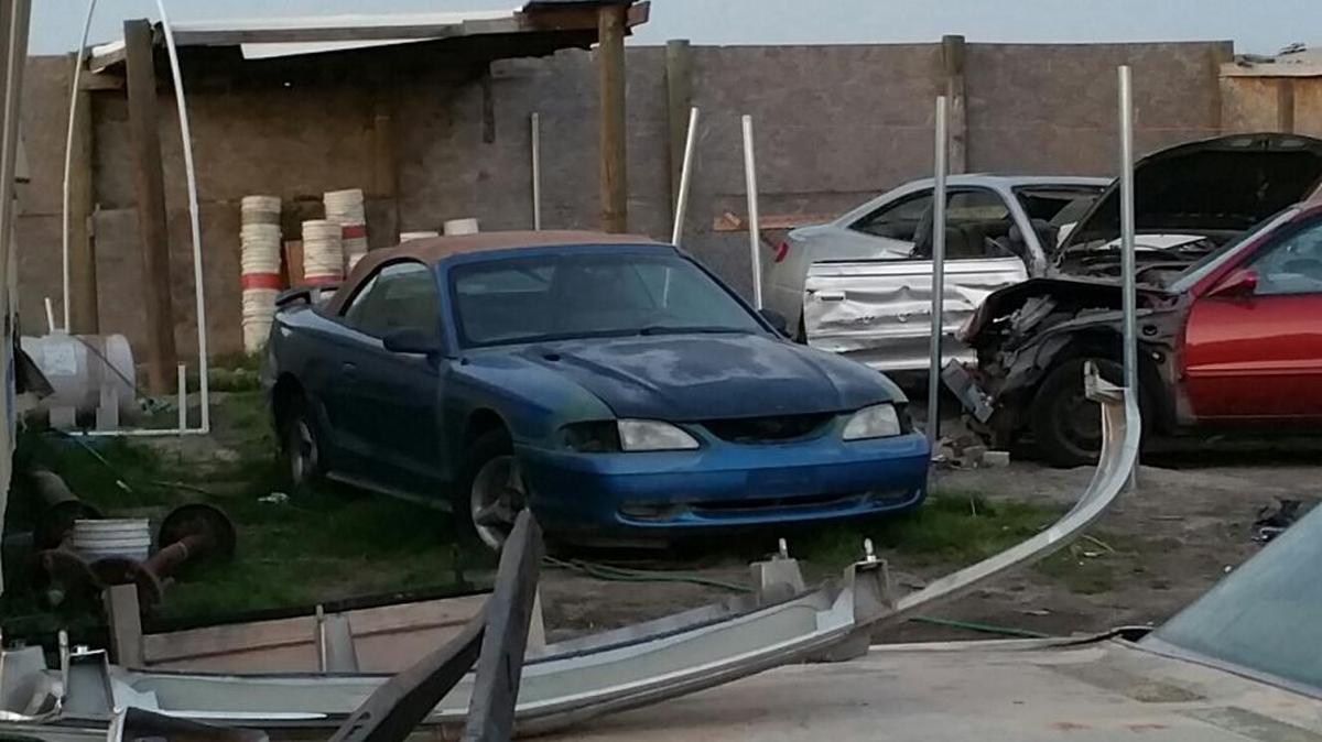 Vehicles found at the suspected chop shop in rural Fresno County.