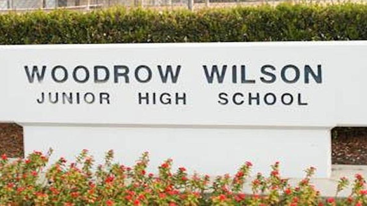 A drive-by shooting at Woodrow Wilson Junior High in Hanford left a woman injured.