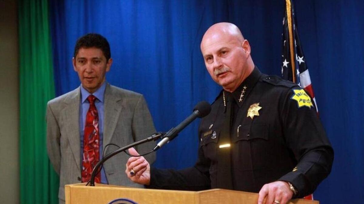 Fresno police Chief Jerry Dyer and attorney Arturo González in a photo from a previous case. González represented the family of Veronica Lynn Canter, 48, in a federal civil rights trial that ended with a verdict in favor of police.