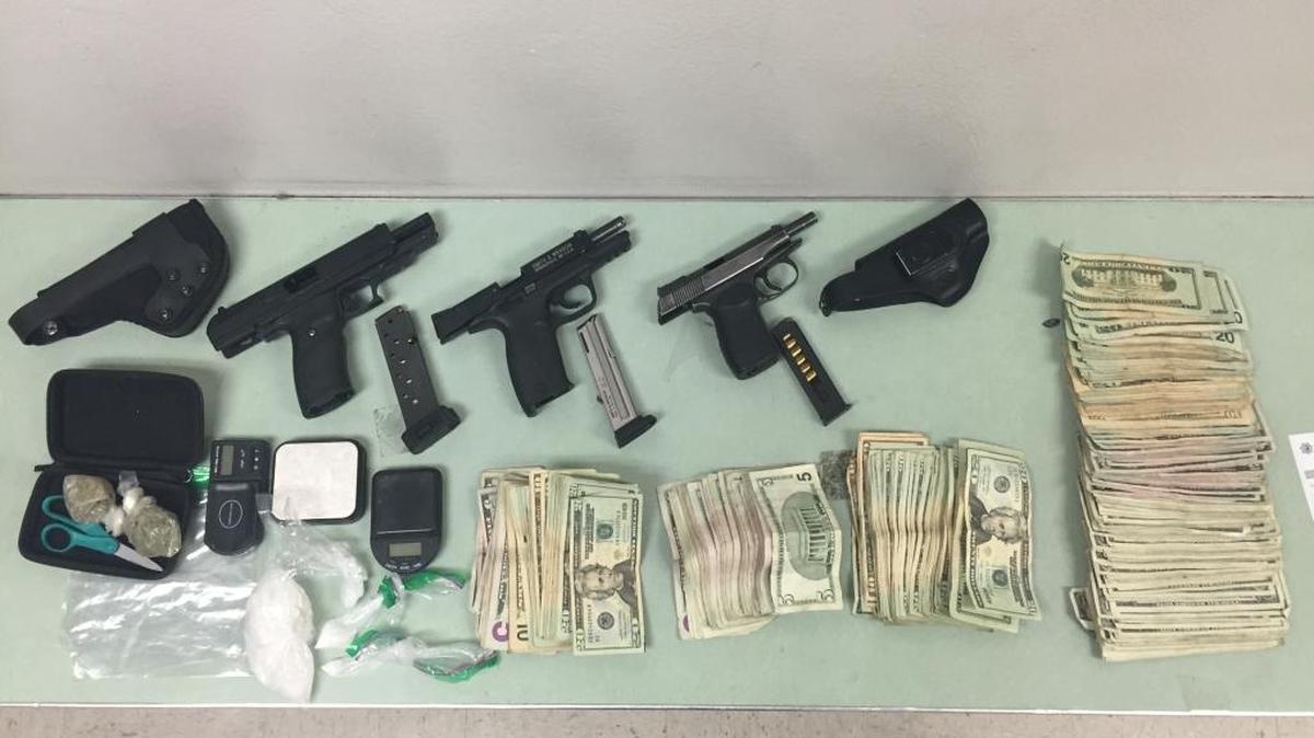 Drugs, guns and cash seized at a Fresno-area home.