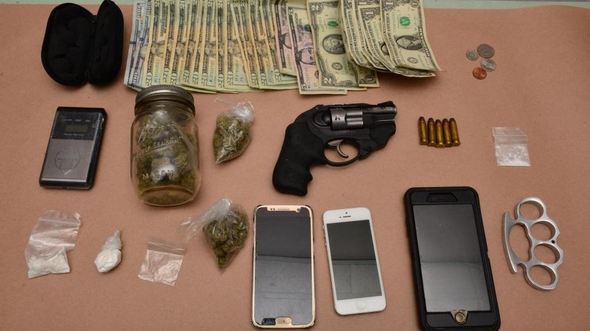 Officers found illegal drugs, brass knuckles, cash, a digital scale and a firearm in the vehicle Jose Cruz, 22, of Fresno was driving Saturday morning, Fresno police said.