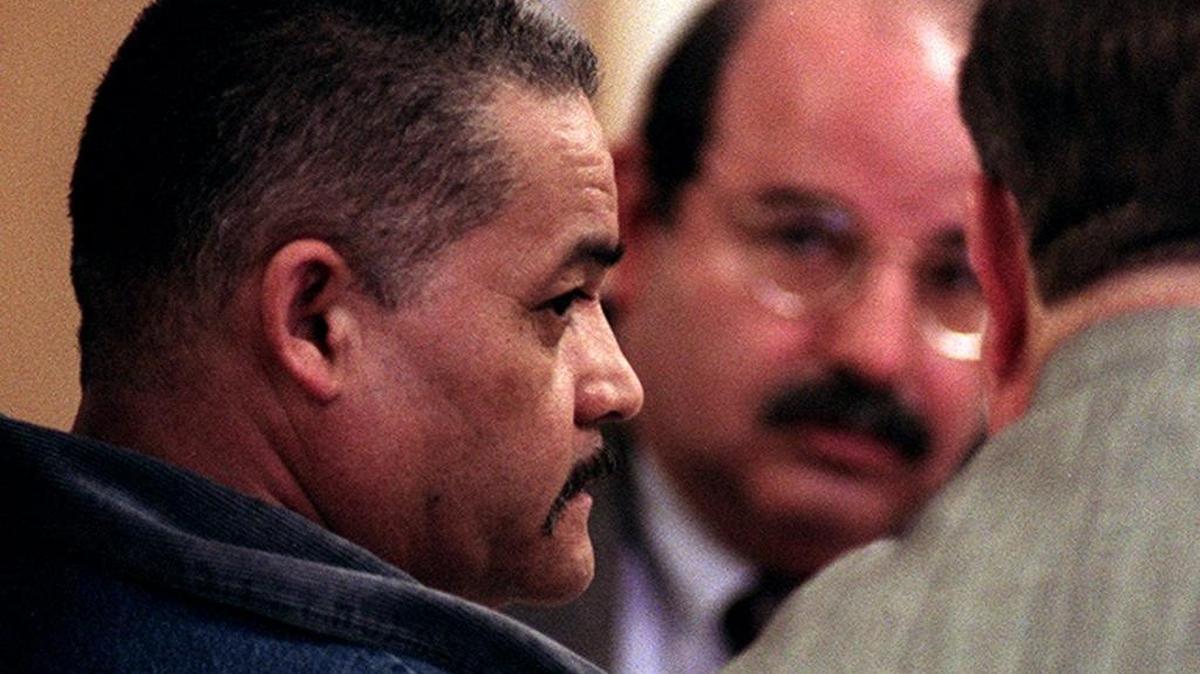 Pedro Rangel Jr., left, listens to his attorneys Roger Litman, right, and Sal Sciandra, center, before being escorted from the Madera County Superior Court of John DeGroot after being served with the death penalty sentence in 1999 for his murder conviction.